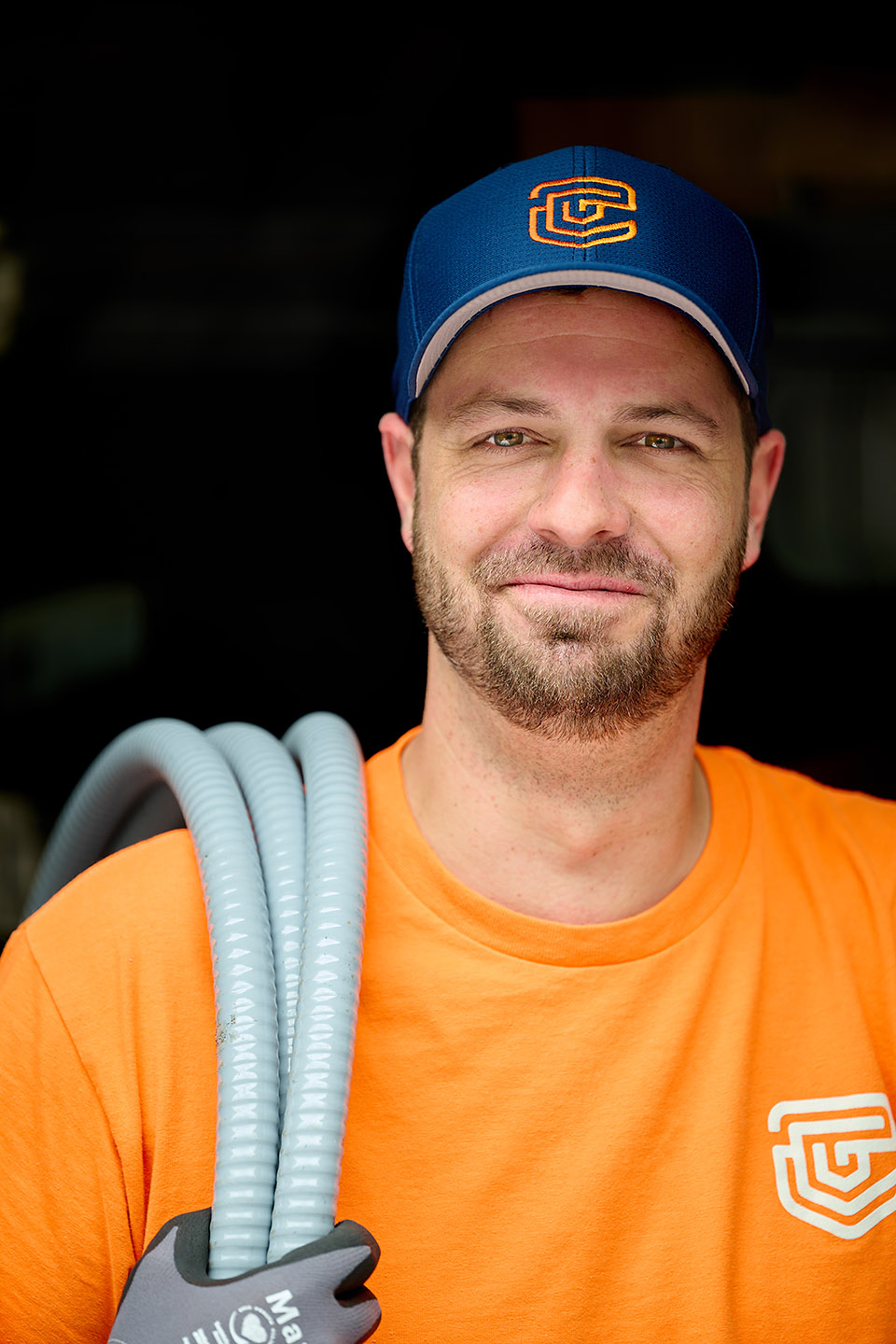 Portrait of a TC Controls technician on-site at the Cambridge office building