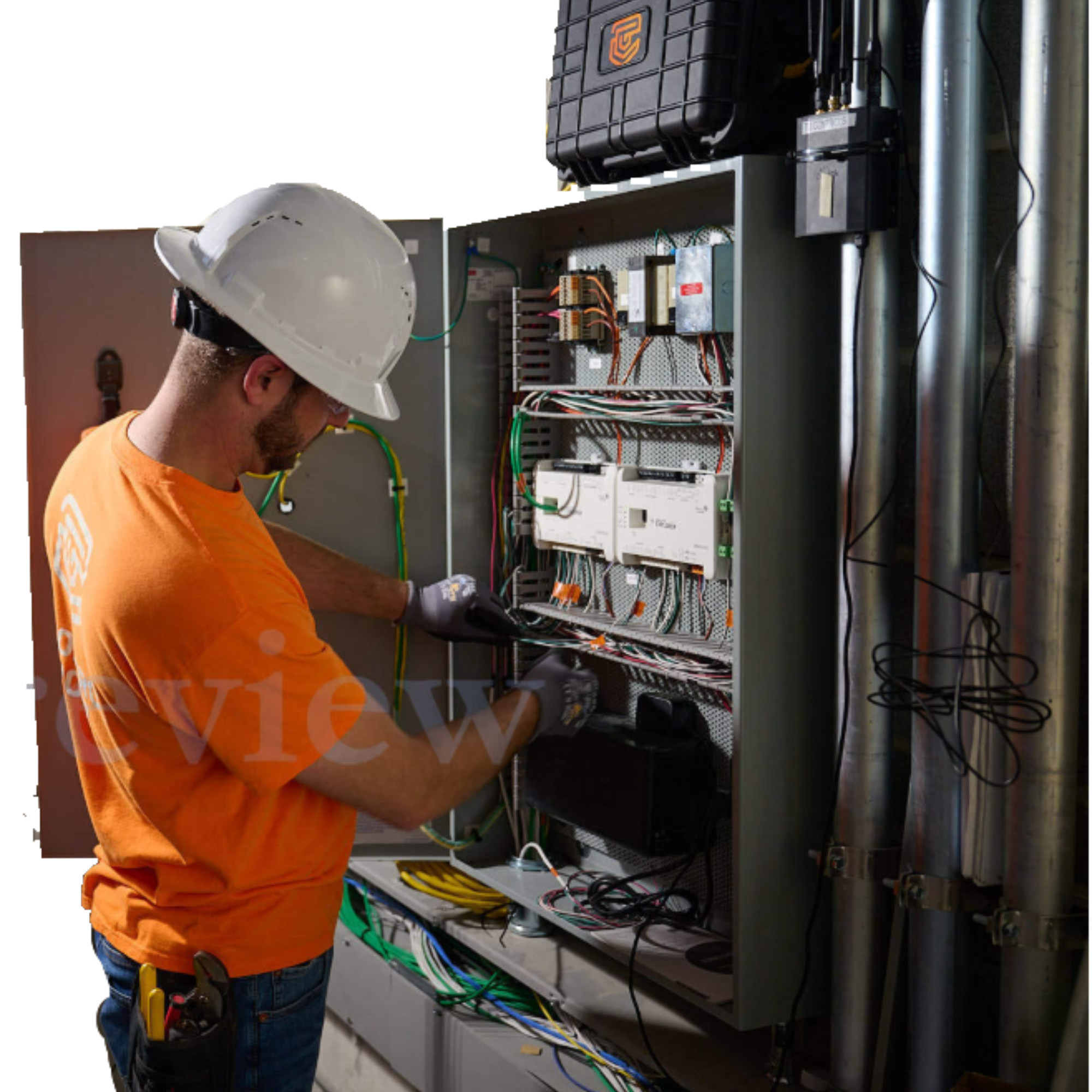 TC Controls technician working on a Johnson Controls Facility Explorer control panel